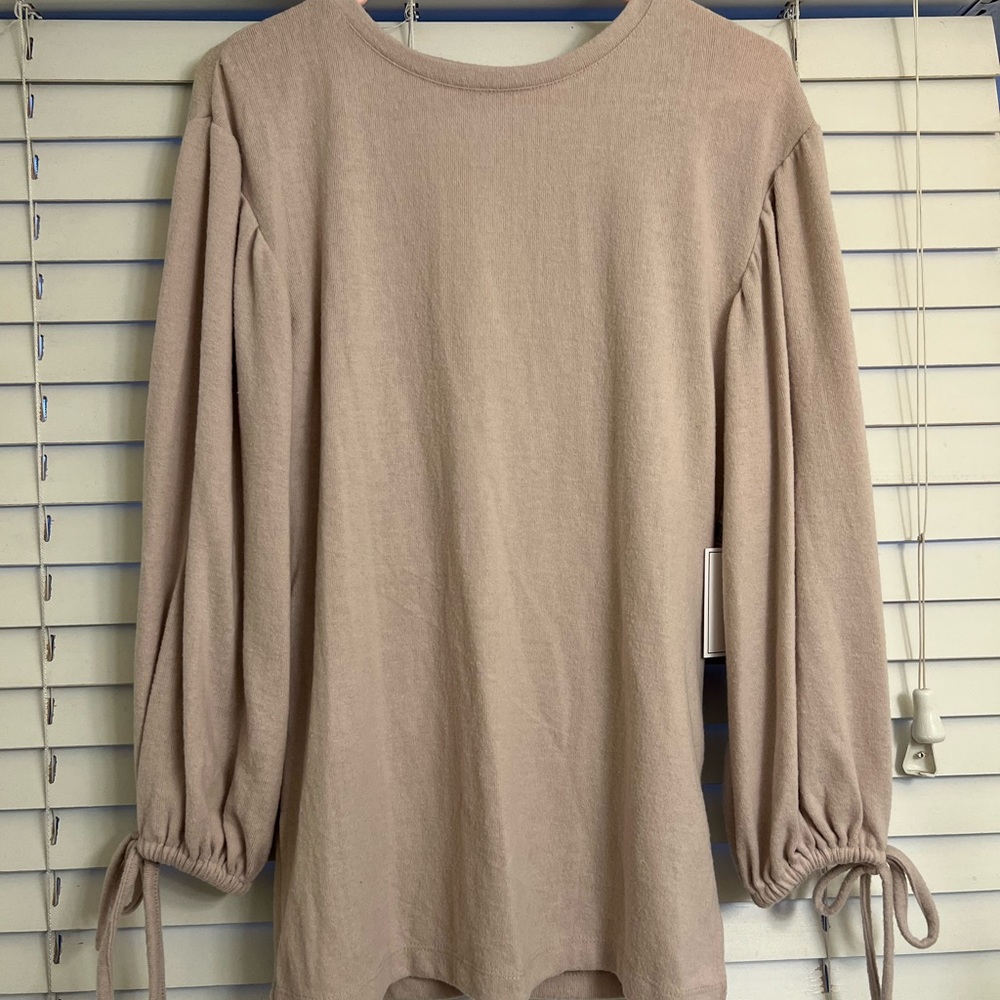 Sweater with drape back. Brand new never been worn with tags